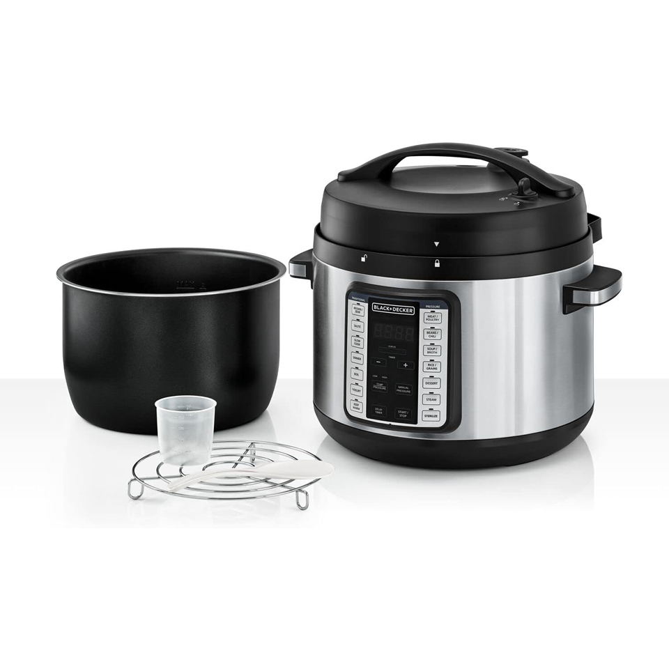 Stainless steel Black + Decker PCP1010 10L electric pressure cooker with digital control panel next to a black inner pot, measuring cup, steaming rack, and spoon on a white background.