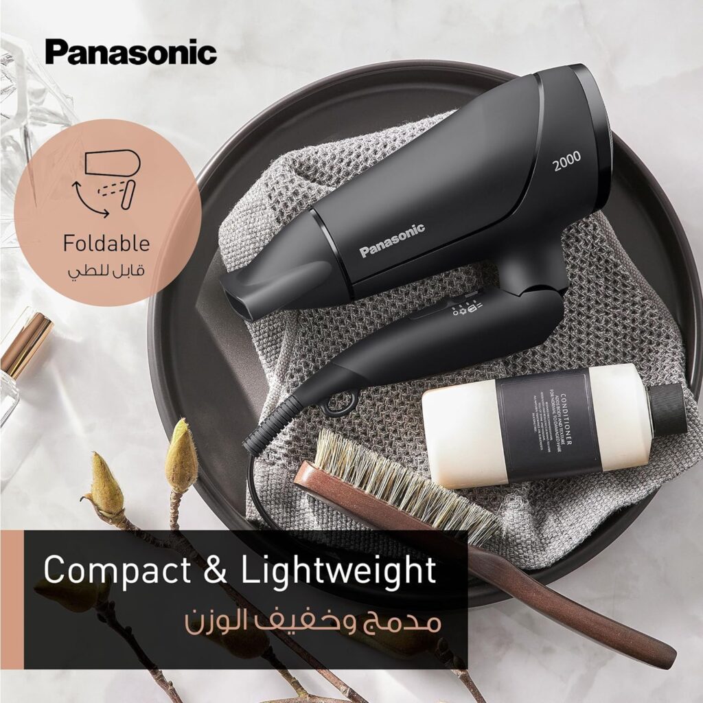 Panasonic hair dryer EH-ND65 shown with foldable handle and compact, lightweight design