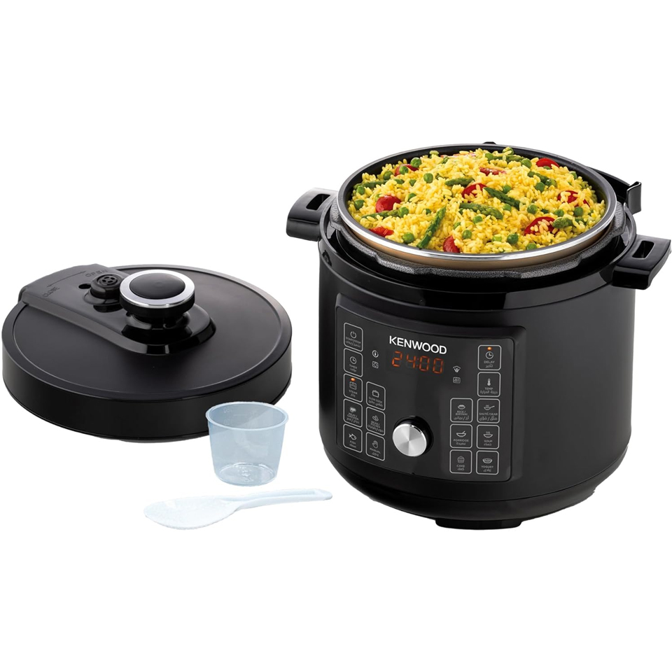 Black Kenwood PCM95 8L electric pressure cooker with removable lid open, showing cooked rice with vegetables inside the inner pot alongside a measuring cup and spoon.